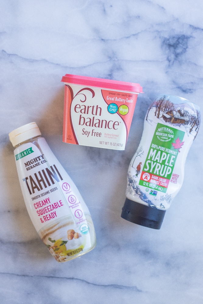 showing ingredients needed to make vegan caramel sauce with tahini and maple syrup