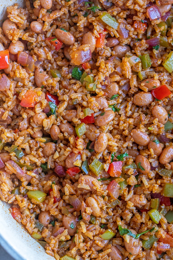 close up of southwestern inspired rice and bean stir fry in a pan