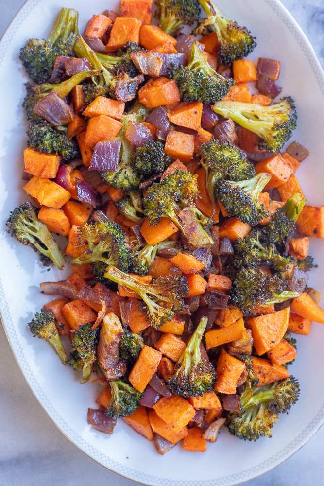 roasted sweet potato and broccoli on a serving platter