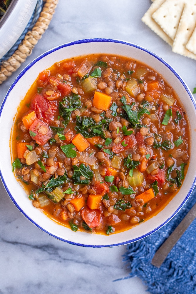 quick and easy vegetarian lentil soup in a bowl with crackers