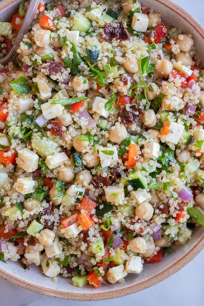 close up of a bowl of easy quinoa salad with vegetables
