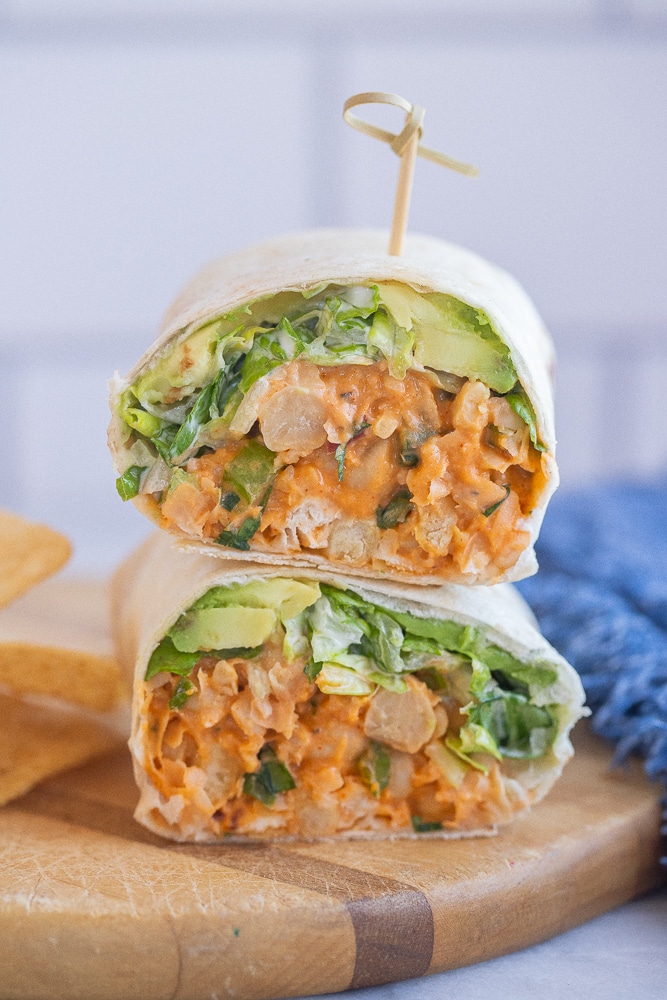 vegetarian buffalo chickpea wrap cut in half and stacked up