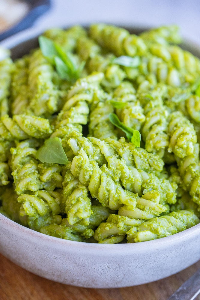 close up of a bowl of green goddess pesto pasta