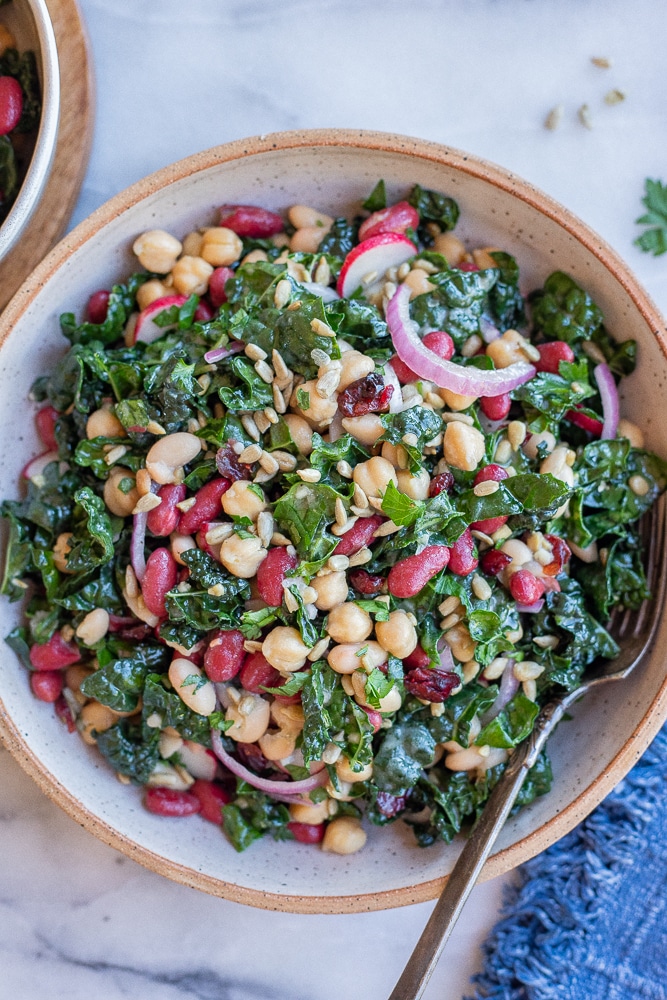 beans and greens salad in a serving bowl