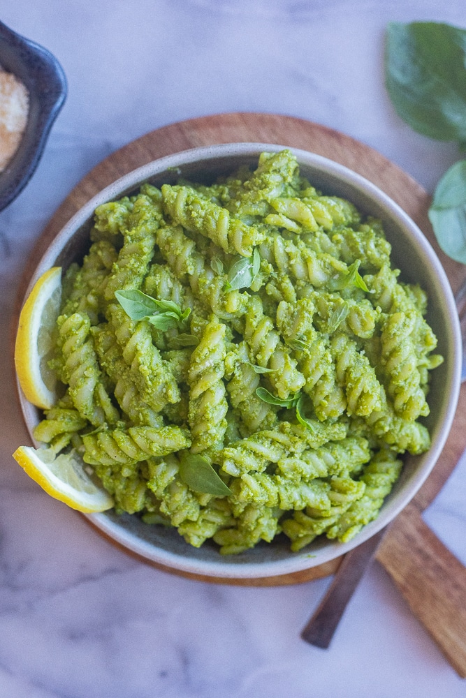 bowl of green goddess pasta in a bowl on a cutting board