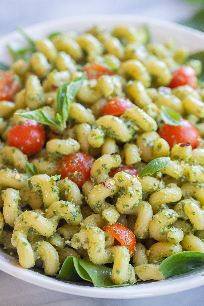 close up of a bowl of avocado pesto pasta