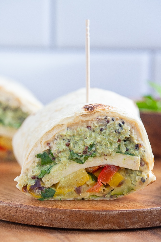 close up of a high protein vegetarian wrap that has been cut in half