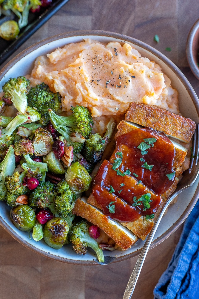 vegetarian thanksgiving bowl with tofu and bbq sauce