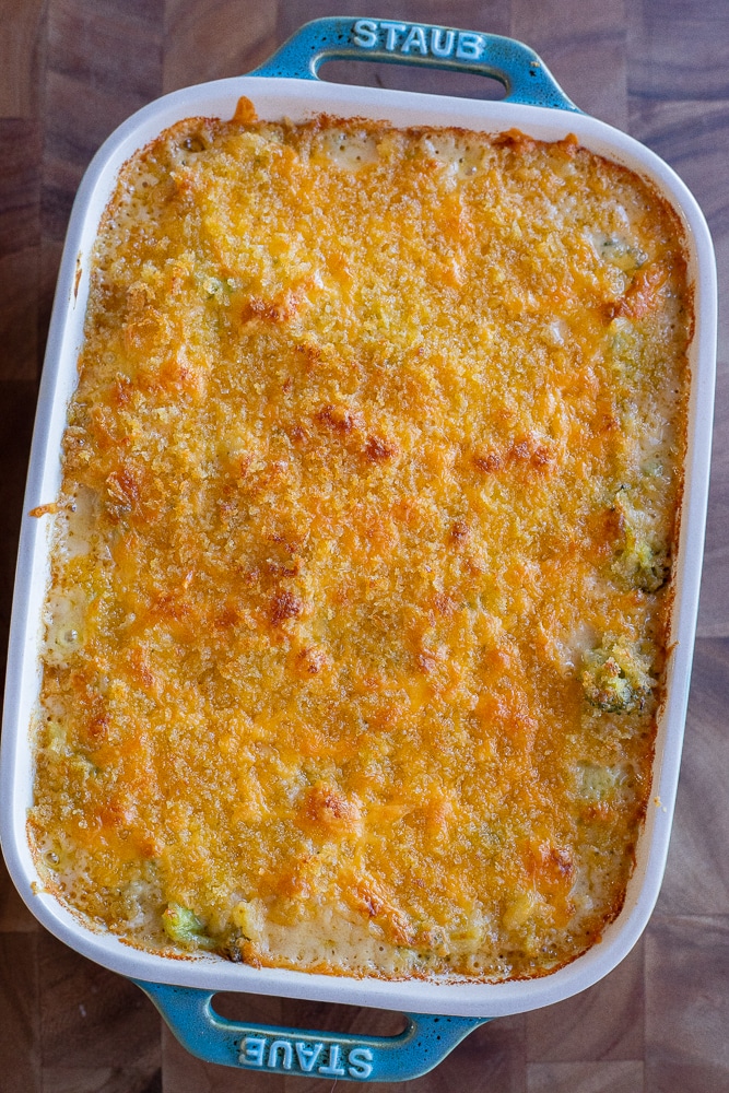 cheesy rice broccoli casserole out of the oven with a crispy top
