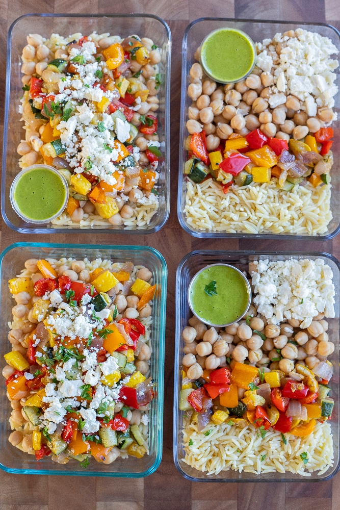 Chickpea Orzo Bowls with Roasted Veggies and Lemon Parsley Dressing in meal prep containers