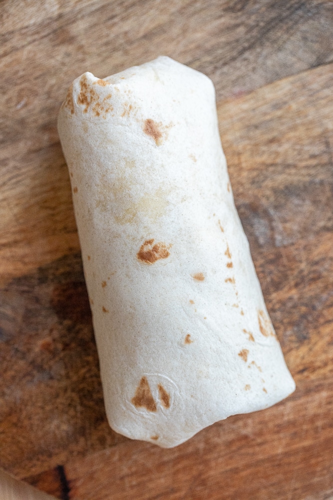 beet salad wrap before it has been cut in half