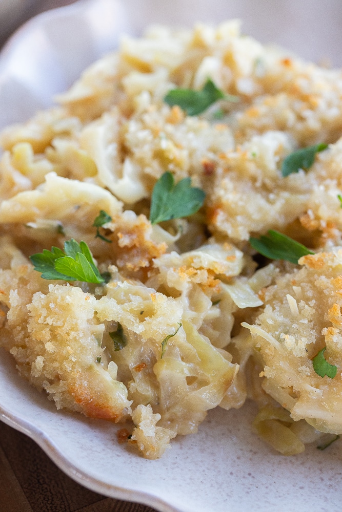 close up of cheesy baked cabbage topped with crispy breadcrumbs
