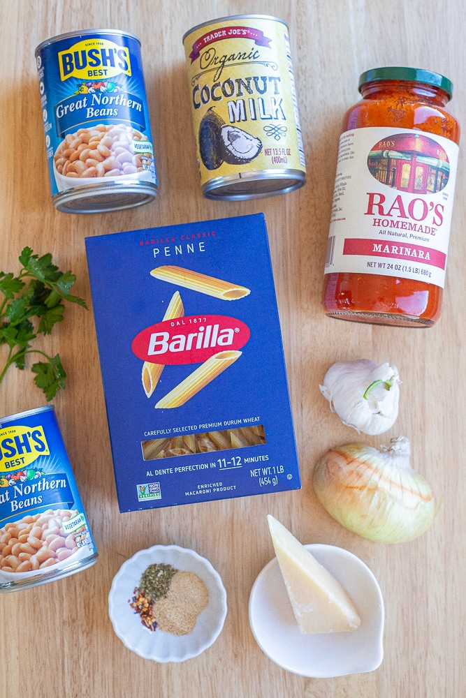 All the ingredients needed to make this creamy tomato pasta with white beans recipe