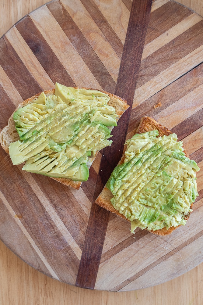 Avocado toast on a cutting board