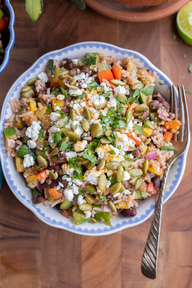 serving bowl full of black bean and rice salad with vegetable