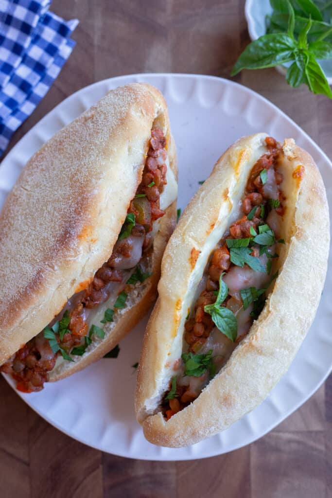 Plate with two cooked meaty lentil subs