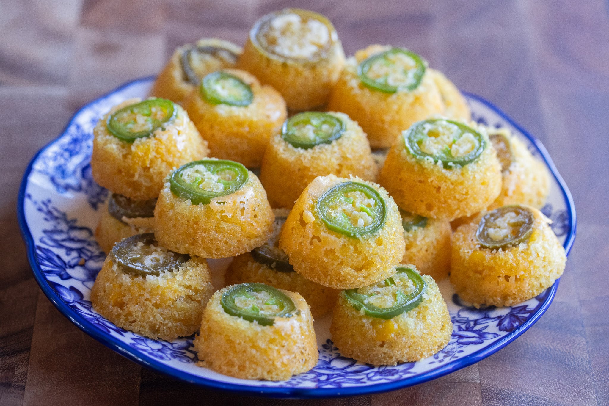 Serving plate full of upside down jalapeño cornbread bites